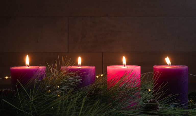 candles lit in a church